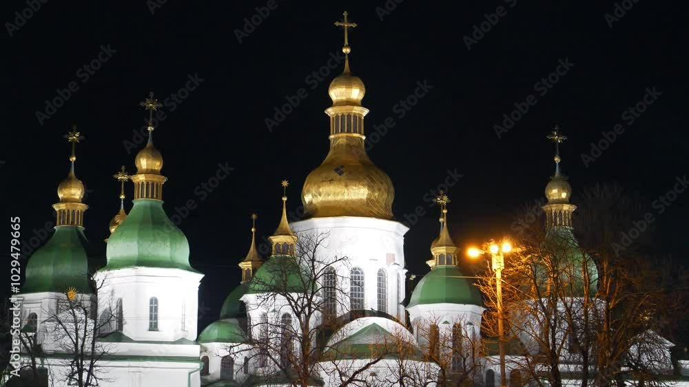 Golden cupolas of Saint Sophia Cathedral or Sophia of Kiev in Ukraine, ancient historical monument of Kievan Rus. Today it is one of city best known landmarks Golden cupolas of Saint Sophia Cathedral or Sophia of Kiev in Ukraine, ancient historical monument of Kievan Rus. Today it is one of city best known landmarks