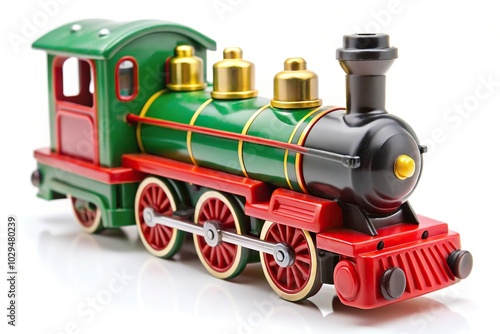 Plastic toy steam locomotive on white background