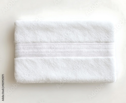 Folded White Bath Towel on White Background 