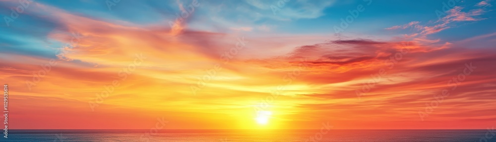 Vibrant sunset over the ocean with colorful clouds and radiant sky. Vibrant sunset over the ocean with colorful clouds and radiant sky.