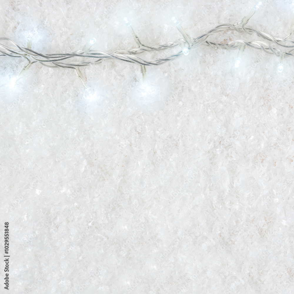 Obraz premium Winter background composition with decorative snow and New Year lights. Minimal Christmas or New Year concept.