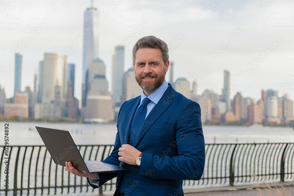 Man send business email and surf on a web browser. Businessman freelancing in New York. Business man working online. Businessman busy working on laptop or computer outdoor. Seize opportunities Man send business email and surf on a web browser. Businessman freelancing in New York. Business man working online. Businessman busy working on laptop or computer outdoor. Seize opportunities