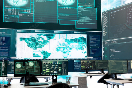 Cyber security monitoring room with high tech equipment. Governmental focus on cyber operations, cyber surveillance, and digital threats protection in an empty command workspace.