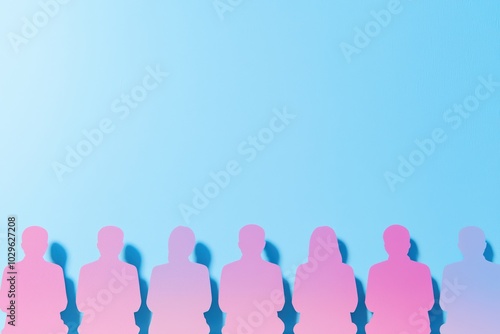 Silhouettes of people in various poses against a gradient blue background, perfect for teamwork or diverse community themes.