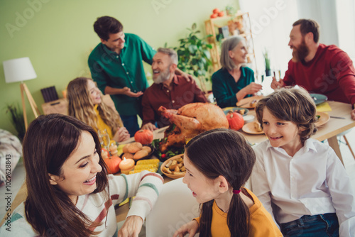 Photography Photo of charming happy big family celebrating thanksgiving day cozy warm atmosp