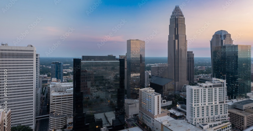 Obraz premium Downtown Charlotte city skyline of skyscrapers at sunrise, Charlotte, North Carolina, United States.