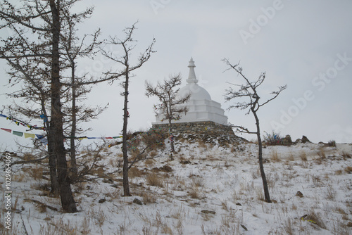 Stupa or Pagoda of Enlightenment on Ogoy Island, the largest deserted island in Lake Baikal. Can see views in all directions  in all directions at South Olkhon island in Siberi,Russia. photo