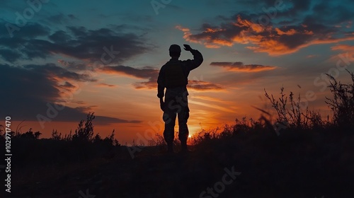 Soldier salute. Silhouette on sunset sky. War, army, military, guard concept