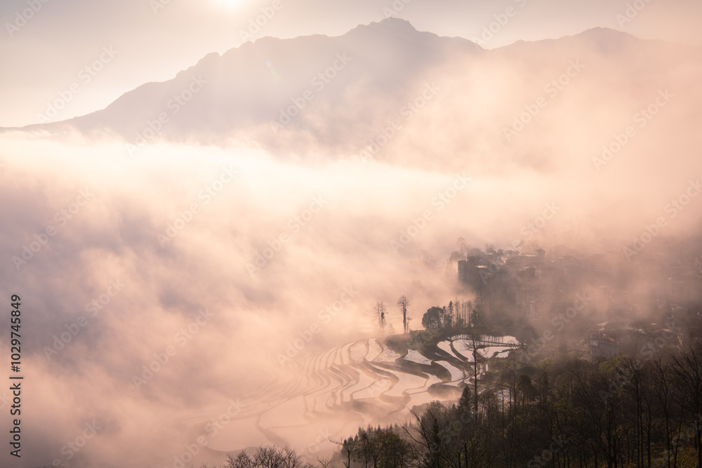Fototapeta premium Sunrise over YuanYang rice terraces in Yunnan, China