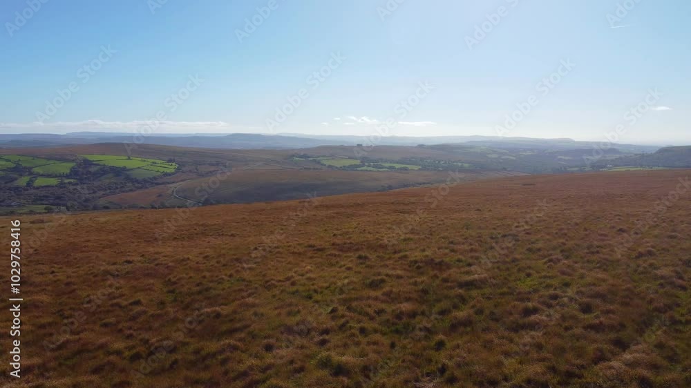 Fast Moving Aerial View Across Open Moor Welsh Countryside with Fields and Trees in Distance 4K Fast Moving Aerial View Across Open Moor Welsh Countryside with Fields and Trees in Distance 4K