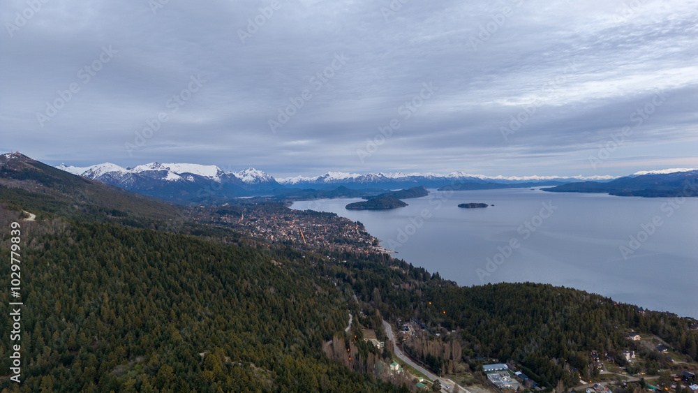 Sunrise in San Carlos de Bariloche with the Circuito Chico and snow-capped mountains in the background. Sunrise in San Carlos de Bariloche with the Circuito Chico and snow-capped mountains in the background.