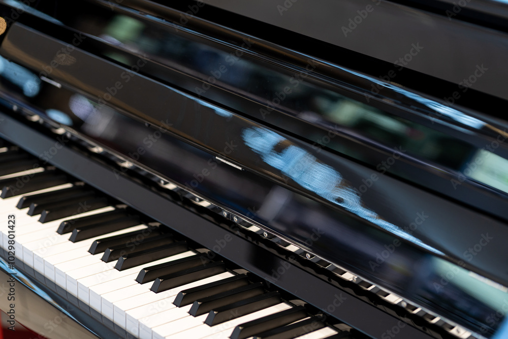 Black and white keys on an electronic piano. Piano keys closeup. Classic piano keyboard. Black and white keys on an electronic piano. Piano keys closeup. Classic piano keyboard.