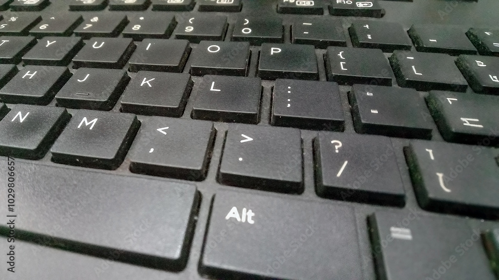 Close-Up Image of a Dual-Language Keyboard Layout Close-Up Image of a Dual-Language Keyboard Layout