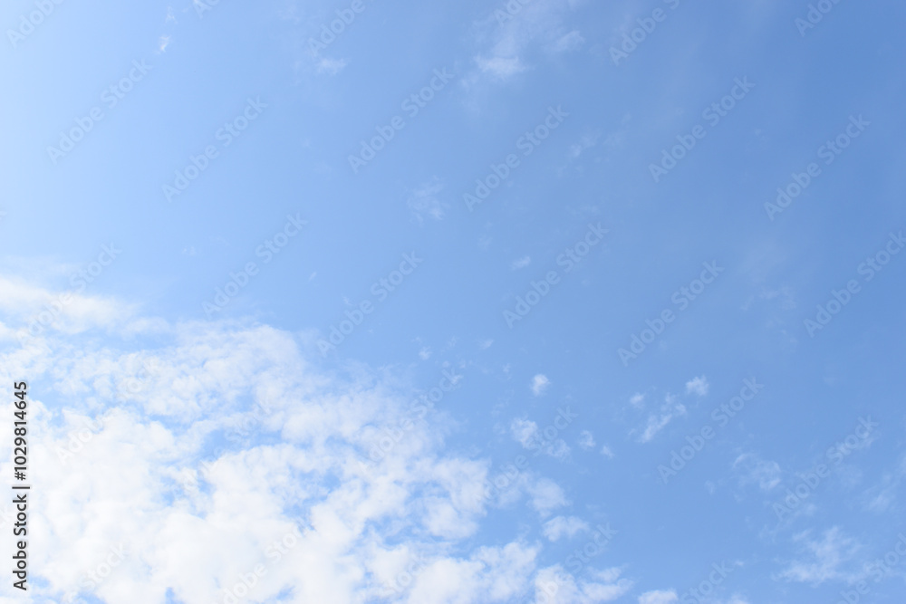 beautiful blue sky and white fluffy group of clouds with sunrise in the morning, natural background beautiful blue sky and white fluffy group of clouds with sunrise in the morning, natural background