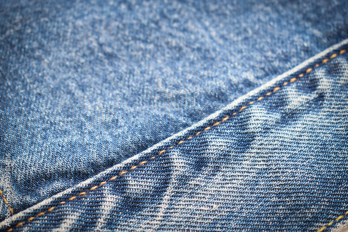 seam of blue denim texture background, jean fashion style photo