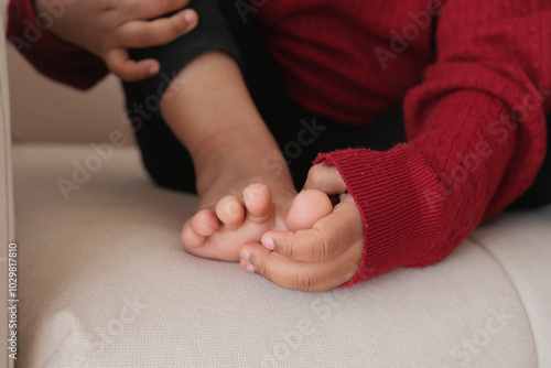 6 year old child suffering pain on feet  photo