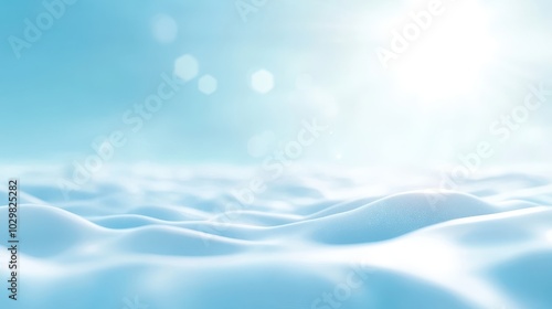 A blue sky with snow and sun. The sun is shining brightly and the snow is reflecting the light. The sky is clear and the snow is white