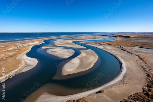 Curving river delta seen from above, branching like veins photo