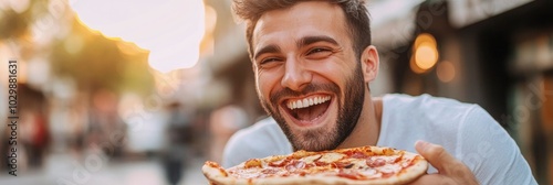 A man enjoying pizz. photo