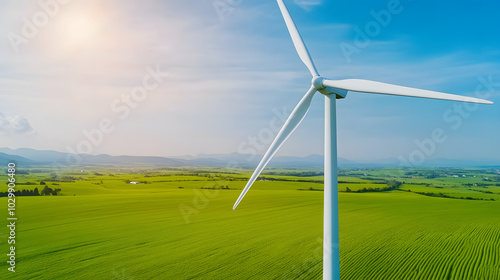 Wind turbines in a vibrant green field with the shift toward renewable energy. Focuses on wind power as a clean, sustainable solution, helping to combat climate change and reduce carbon footprints. photo