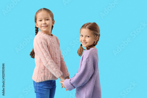 Cute little girls in warm s...