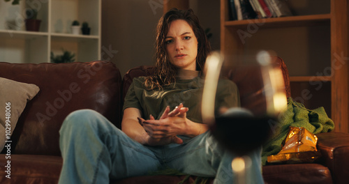 Fotografie Alcoholic, thinking and wine with woman in living room for substance abuse, risk and depression