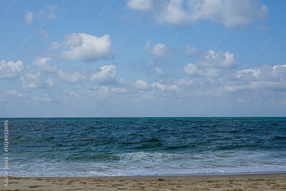 Sky with clouds over the ocean with sandy shore. Sky with clouds over the ocean with sandy shore.