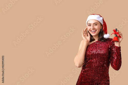Happy young woman in Santa ...