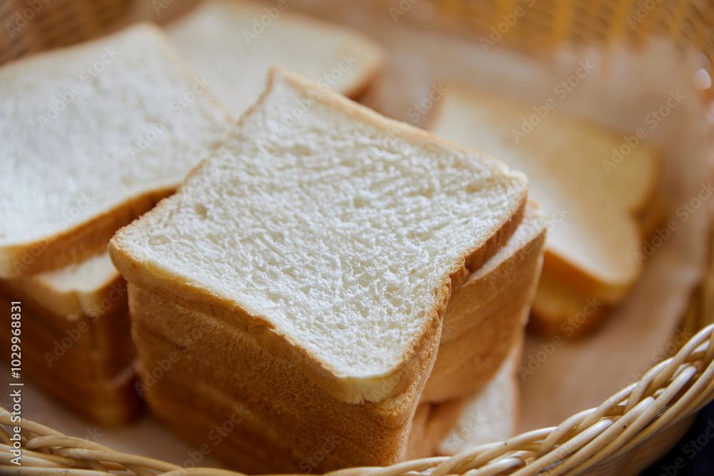 Slices whole wheat bread in wicker basket Slices whole wheat bread in wicker basket