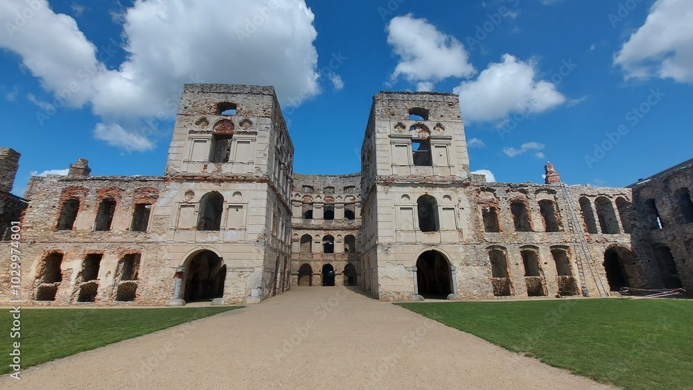 Old abandoned palace in Romanesque style built of stone. Old abandoned palace in Romanesque style built of stone.