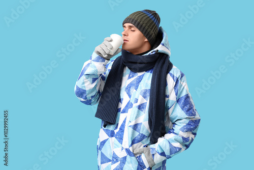 Young man in stylish puffer...
