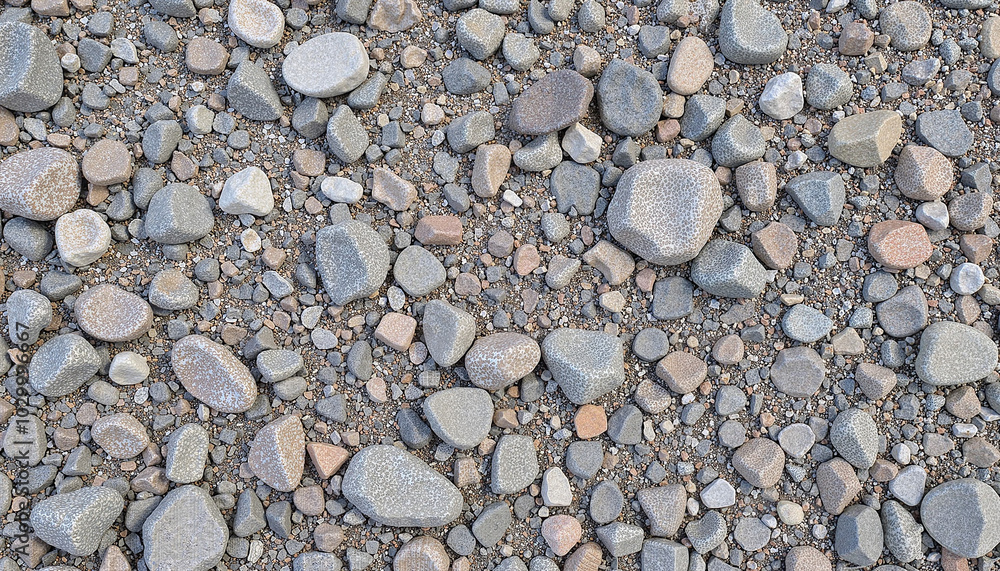 Gray stone texture surface with gravel, earthy color palette Gray stone texture surface with gravel, earthy color palette