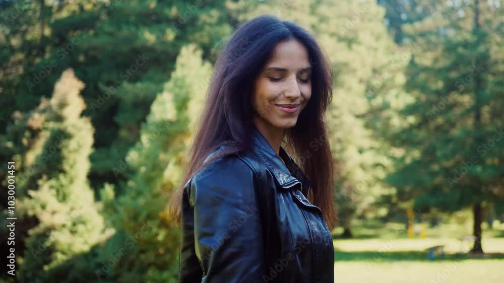 A woman with a warm smile, bathed in the golden light of a park. A moment of happiness, amidst the rustling leaves and vibrant colours. Outdoor portrait of a woman, showcasing a warm A woman with a warm smile, bathed in the golden light of a park. A moment of happiness, amidst the rustling leaves and vibrant colours. Outdoor portrait of a woman, showcasing a warm