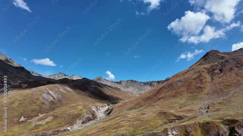 4K Mountain Landscape Back-to-Front View Lush Green and Dark Rocky Mountains, Motion Clouds, and Dramatic Lighting – Contrasting Sunlit and Shadowed Scenes 4K Mountain Landscape Back-to-Front View Lush Green and Dark Rocky Mountains, Motion Clouds, and Dramatic Lighting – Contrasting Sunlit and Shadowed Scenes