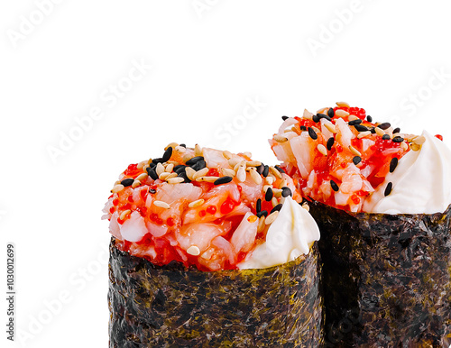 Two gunkan sushi pieces with tobiko and spicy mayo standing on white background photo