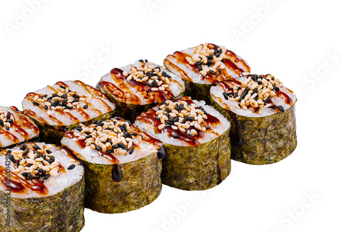 Sushi rolls with unagi sauce and sesame seeds on white background