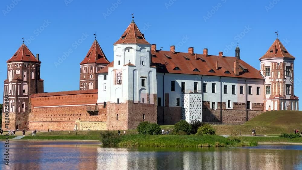 Mir Castle complex. The Architectural Ensemble Of Feudalism, An Ancient Cultural Monument, A UNESCO World Heritage Site. Under the Blue Sky, Mir Castle of the XVI-XX centuries. Belarusian Gothic. 4К Mir Castle complex. The Architectural Ensemble Of Feudalism, An Ancient Cultural Monument, A UNESCO World Heritage Site. Under the Blue Sky, Mir Castle of the XVI-XX centuries. Belarusian Gothic. 4К
