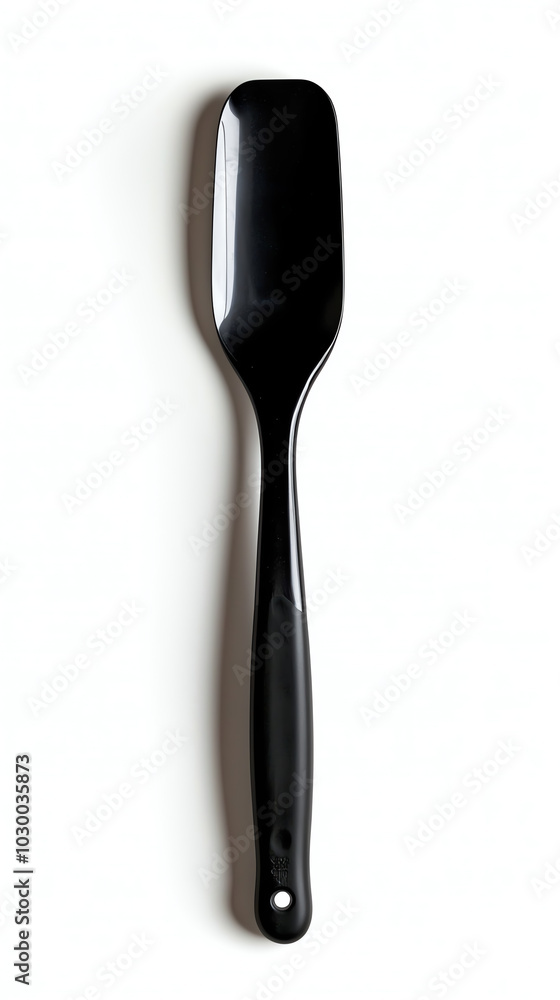 Black spatula, white isolated background Black spatula, white isolated background