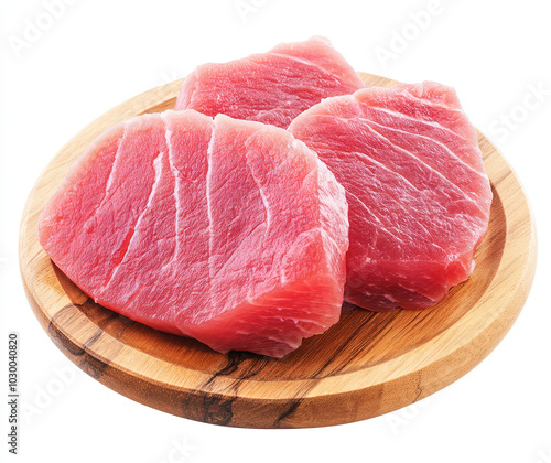 Fresh Raw Tuna Steaks on Wooden Board photo