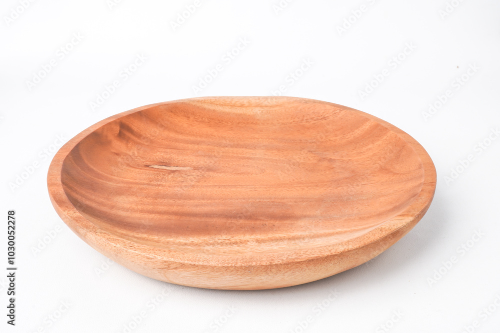 Close-up photo of Circular Wooden plate isolated on white background. Shot on 30 Degree angle setup. Close-up photo of Circular Wooden plate isolated on white background. Shot on 30 Degree angle setup.