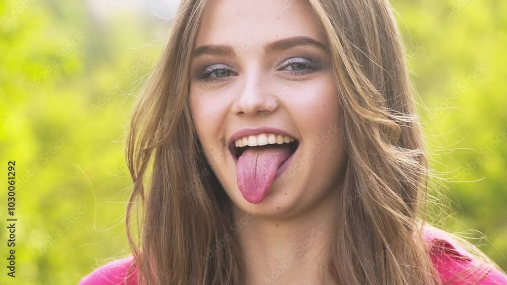 Girl smiling happy. Woman portrait in a closeup outdoor. Face, female person and beauty. Closeup portrait of young happy girl. Smiling girl. Happy, carefree and woman. Funny girl face. Girl smiling happy. Woman portrait in a closeup outdoor. Face, female person and beauty. Closeup portrait of young happy girl. Smiling girl. Happy, carefree and woman. Funny girl face.