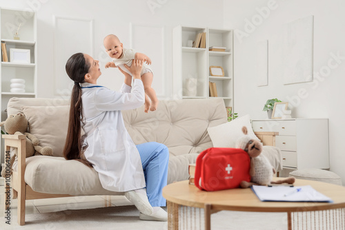 Female pediatrician with li...