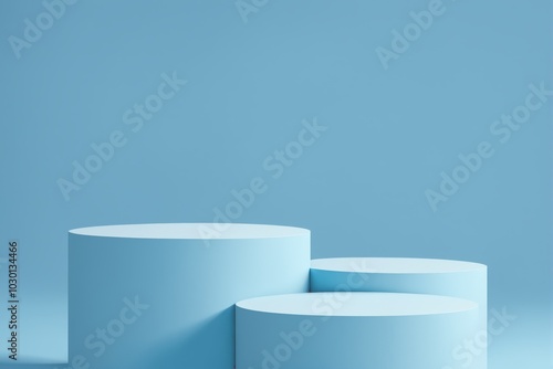 Pastel blue cylindrical podiums against a light blue background