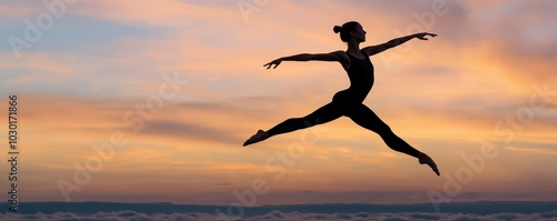 Wallpaper Mural Silhouette of a ballerina performing a graceful leap against a vibrant sunset sky Torontodigital.ca