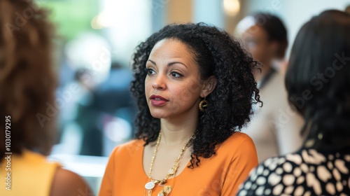 Woman Entrepreneur Engaging in Conversations in a Professional Setting