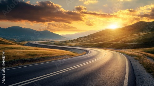 Wallpaper Mural Curved highway through mountains under a golden sunset sky, showcasing the tranquil beauty of nature and the allure of open roads. Torontodigital.ca