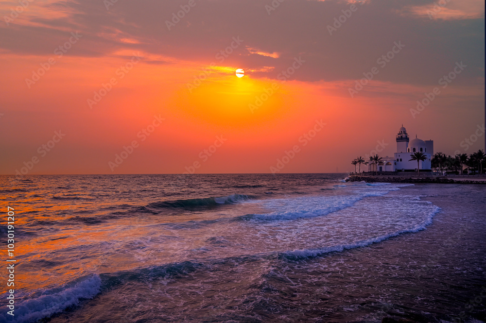 A aesthetic view of Island Mosque Jeddah, in a sunset over the sea A aesthetic view of Island Mosque Jeddah, in a sunset over the sea