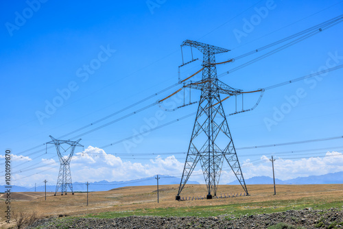 High voltage power tower scenery under the blue sky. electricity transmission concept.