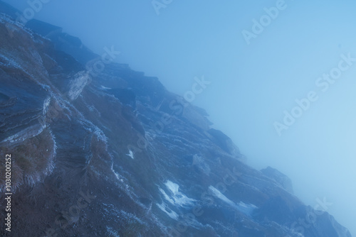 Obraz na płótnie Fog and clouds in the mountains. Mountain landscape with clouds and nebula. Horizontal image. w salonie