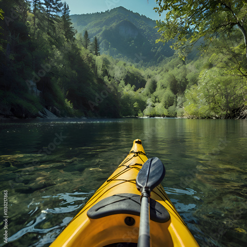 yellow kayak on the river photo